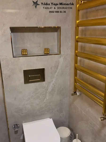 Banyo duvar nişi ve gold havlupan uygulaması